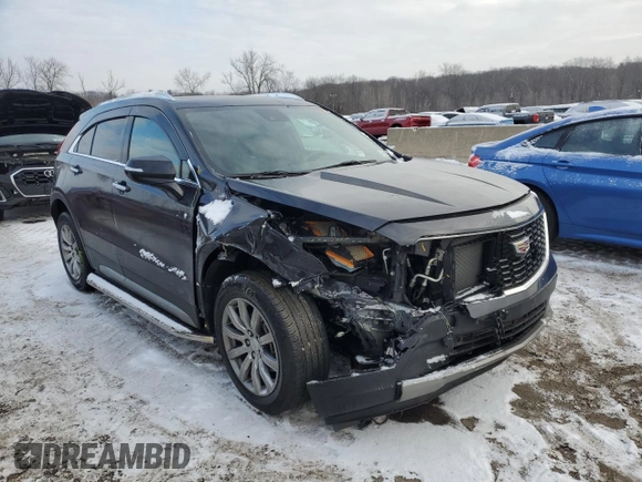 2022 Cadillac XT4 AWD Premium Luxury with VIN 1GYFZDR42NF140322, listed as a Copart auction lot 89084545 with 32,440 mi miles and Salvage Title. Bid and sale history available at carsss.com. Image 4.