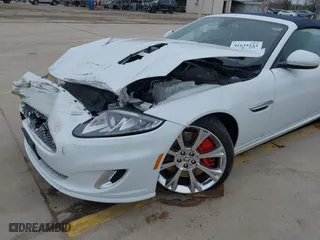 2014 Jaguar XK with VIN SAJWA4EC9EMB52042, listed as a IAAI auction lot 41635233 with 10,566 mi miles. Bid and sale history available at carsss.com. Image 6.
