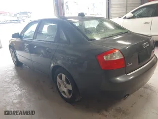 2004 Audi A4 1.8T with VIN WAULC68E04A055889, listed as a IAAI auction lot 41986309 with 124,598 mi miles. Bid and sale history available at carsss.com. Image 3.