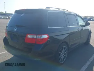 2007 Honda Odyssey EX-L with VIN 5FNRL386X7B128430, listed as a IAAI auction lot 42146089 with 231,059 mi miles and . Bid and sale history available at DreamBid. Image 4.