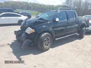 2014 Nissan Frontier SV with VIN 1N6AD0EV0EN758585, listed as a IAAI auction lot 41943169 with 186,214 mi miles and . Bid and sale history available at DreamBid. Image 2.