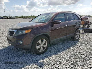 2012 Kia Sorento EX with VIN 5XYKU3A69CG248327, listed as a Copart auction lot 52068555 with 197,536 mi miles and Salvage title. Bid and sale history available at DreamBid. Image 1.