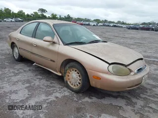 1996 Mercury Sable LS z VIN 1MELM53S6TA606332, wystawiony jako IAAI lot #41984196 z przebiegiem 150 924 mil mil oraz . Historia ofert i sprzedaży dostępna na DreamBid. Obrazek 1.