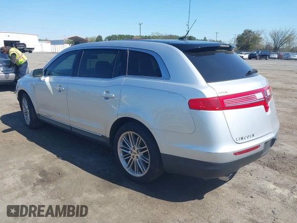 2015 Lincoln MKT EcoBoost with VIN 2LMHJ5AT4FBL00959, listed as a IAAI auction lot 41991763 with 159,687 mi miles and . Bid and sale history available at DreamBid. Image 3.