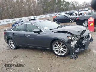 2016 Mazda Mazda6 i Touring with VIN JM1GJ1V56G1462637, listed as a IAAI auction lot 41603296 with 143,931 mi miles. Bid and sale history available at carsss.com. Image 13.