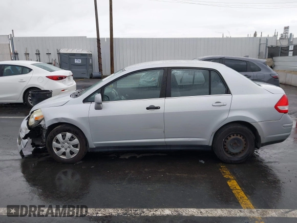 2009 Nissan Versa S with VIN 3N1BC11E39L364397, listed as a IAAI auction lot 41788772 with 223,959 mi miles and . Bid and sale history available at DreamBid. Image 14.
