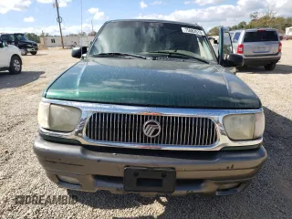 2000 Mercury Mountaineer z VIN 4M2ZU66P1YUJ05468, wystawiony jako Copart lot #75682513 z przebiegiem 211 748 mil mil oraz Szkoda całkowita • Salvage title. Historia ofert i sprzedaży dostępna na DreamBid. Obrazek 5.