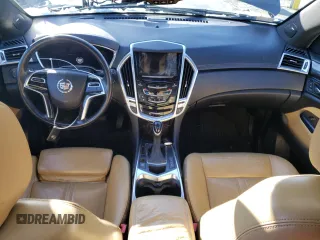 2014 Cadillac SRX Premium Collection z VIN 3GYFNGE37ES566089, wystawiony jako Copart lot #83595454 z przebiegiem 209 155 mil mil oraz Szkody całkowita. Historia ofert i sprzedaży dostępna na DreamBid. Obrazek 8.