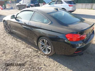 2014 BMW 4 Series 428i xDrive with VIN WBA3N9C55EF721295, listed as a IAAI auction lot 42139256 with 85,472 mi miles and . Bid and sale history available at carsss.com. Image 3.