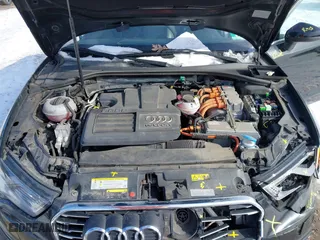 2016 Audi A3 e-tron Premium Plus with VIN WAUTPBFF8GA050534, listed as a IAAI auction lot 41378962 with 104,975 mi miles. Bid and sale history available at carsss.com. Image 10.