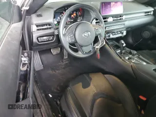 2021 Toyota GR Supra 3.0 with VIN WZ1DB0C09MW036216, listed as a Copart auction lot 86403444 with 14,800 mi miles and Salvage Title. Bid and sale history available at carsss.com. Image 8.