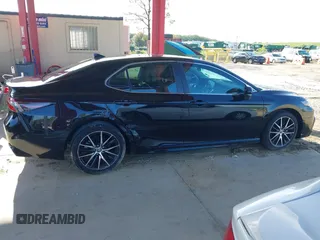 2023 Toyota Camry SE z VIN 4T1G11AKXPU747251, wystawiony jako IAAI lot #42388819 z przebiegiem 39 542 mil mil oraz . Historia ofert i sprzedaży dostępna na DreamBid. Obrazek 13.