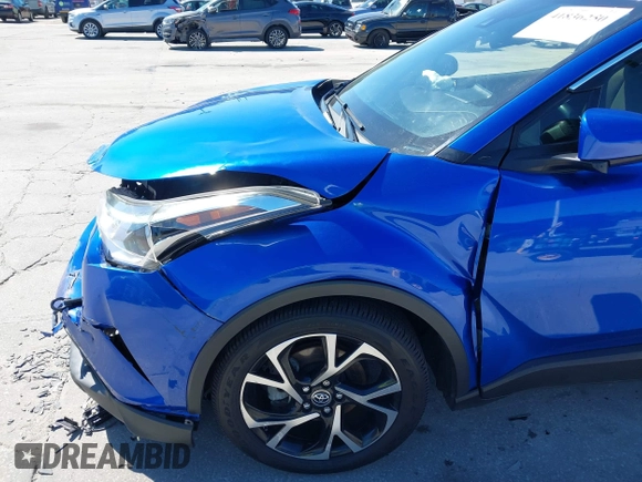 2018 Toyota C-HR XLE with VIN JTNKHMBXXJ1004583, listed as a IAAI auction lot 41836250 with 119,858 mi miles and . Bid and sale history available at DreamBid. Image 6.
