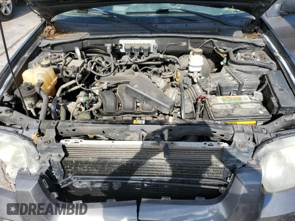 2005 Ford Escape Limited with VIN 1FMYU041X5KC72704, listed as a Copart auction lot 57819655 with 179,469 mi miles and Salvage title. Bid and sale history available at DreamBid. Image 12.