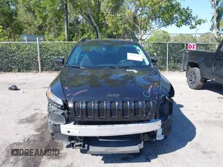 2016 Jeep Cherokee Latitude with VIN 1C4PJLCB6GW184264, listed as a IAAI auction lot 41783299 with 187,767 mi miles. Bid and sale history available at carsss.com. Image 12.