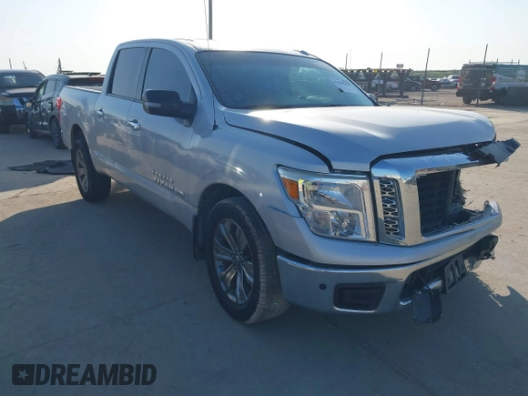 2018 Nissan Titan SV with VIN 1N6AA1E62JN502207, listed as a IAAI auction lot 41996558 with 133,051 mi miles and . Bid and sale history available at DreamBid. Image 1.