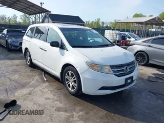 2011 Honda Odyssey EX-L with VIN 5FNRL5H6XBB059162, listed as a IAAI auction lot 42061378 with 164,317 mi miles and . Bid and sale history available at carsss.com. Image 1.