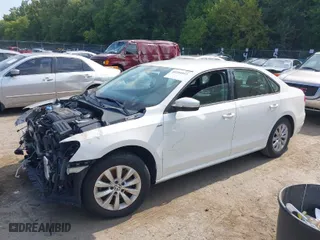 2015 Volkswagen Passat 1.8T Wolfsburg Ed with VIN 1VWAT7A39FC006249, listed as a IAAI auction lot 40204853 with 137,392 mi miles. Bid and sale history available at carsss.com. Image 2.