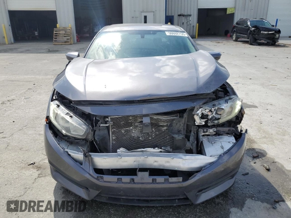 2017 Honda Civic Sedan LX with VIN 19XFC2F52HE062826, listed as a Copart auction lot 50692755 with 123,569 mi miles and Salvage Title. Bid and sale history available at carsss.com. Image 5.