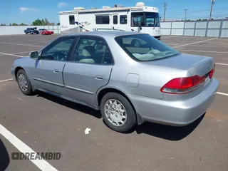 2002 Honda Accord LX with VIN 1HGCG56422A167829, listed as a IAAI auction lot 42401497 with 221,550 mi miles and . Bid and sale history available at DreamBid. Image 3.