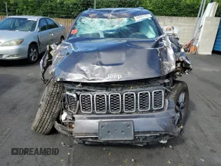 2019 Jeep Grand Cherokee Altitude with VIN 1C4RJFAG5KC591141, listed as a Copart auction lot 56885105 with 88,000 mi miles and Salvage title. Bid and sale history available at DreamBid. Image 5.