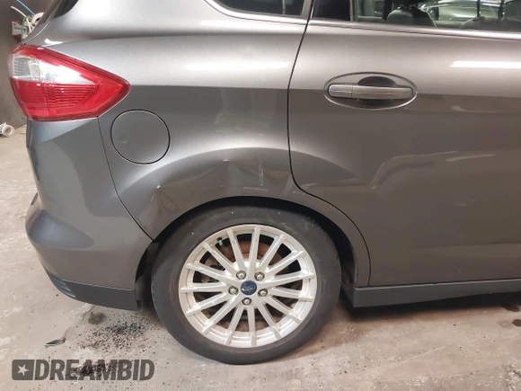 2013 Ford C-Max SEL z VIN 1FADP5BU9DL531704, wystawiony jako IAAI lot #42228841 z przebiegiem 91 808 mil mil oraz . Historia ofert i sprzedaży dostępna na DreamBid. Obrazek 6.