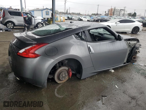 2016 Nissan 370Z Sport с VIN JN1AZ4EH3GM936250, выставлен на аукционе Copart как лот 44227205 с пробегом Не указан миль и Списание • Salvage title. История ставок и продаж доступна на DreamBid. Изображение 3.