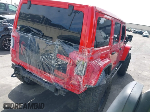2019 Jeep Wrangler Unlimited Sahara with VIN 1C4HJXEN0KW552028, listed as a IAAI auction lot 41934634 with 53,054 mi miles and . Bid and sale history available at DreamBid. Image 4.
