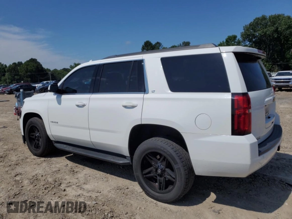 2017 Chevrolet Tahoe LT with VIN 1GNSCBKC2HR183726, listed as a Copart auction lot 60240815 with 164,845 mi miles and Clean title. Bid and sale history available at DreamBid. Image 2.
