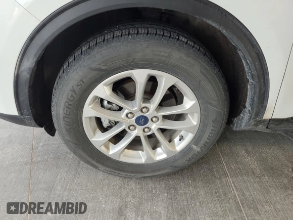 2020 Ford Escape SE with VIN 1FMCU9G63LUB82205, listed as a IAAI auction lot 42663574 with 91,305 mi miles and . Bid and sale history available at DreamBid. Image 25.