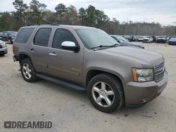 2011 Chevrolet Tahoe LS with VIN 1GNSCAE09BR138852, listed as a Copart auction lot 49165595 with 207,548 mi miles and Salvage title. Bid and sale history available at DreamBid. Image 4.