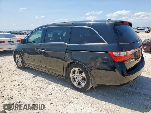 2011 Honda Odyssey Touring with VIN 5FNRL5H90BB033700, listed as a Copart auction lot 58602835 with 197,063 mi miles and Clean title. Bid and sale history available at DreamBid. Image 2.