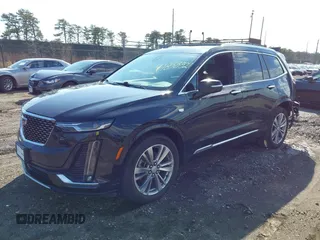 2023 Cadillac XT6 AWD Premium Luxury with VIN 1GYKPDRS8PZ153838, listed as a IAAI auction lot 41838527 with 60,034 mi miles and . Bid and sale history available at DreamBid. Image 2.