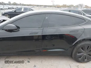 2022 Tesla Model S Plaid with VIN 5YJSA1E65NF484149, listed as a IAAI auction lot 40937538 with 11,459 mi miles and . Bid and sale history available at DreamBid. Image 13.