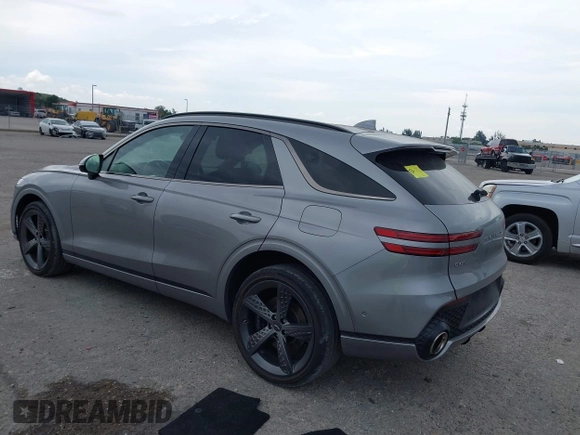 2023 Genesis GV70 Sport with VIN KMUMCDTC1PU098851, listed as a IAAI auction lot 41864774 with 15,016 mi miles and . Bid and sale history available at DreamBid. Image 3.
