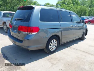 2010 Honda Odyssey EX-L z VIN 5FNRL3H76AB071871, wystawiony jako IAAI lot #42214867 z przebiegiem 255 116 mil mil oraz . Historia ofert i sprzedaży dostępna na DreamBid. Obrazek 4.