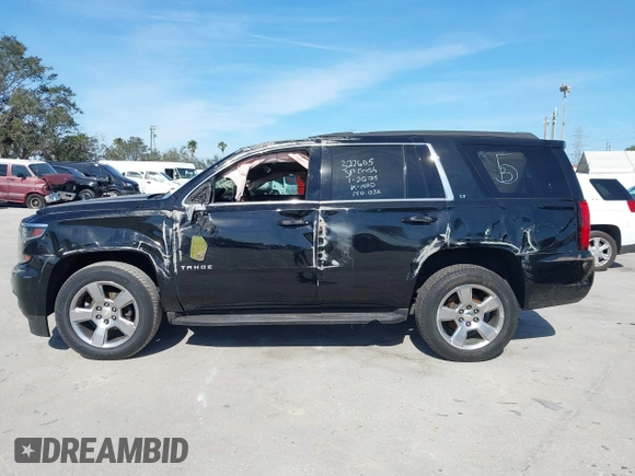 2018 Chevrolet Tahoe LT with VIN 1GNSCBKCXJR132867, listed as a IAAI auction lot 41456319 with 59,131 mi miles and . Bid and sale history available at DreamBid. Image 13.