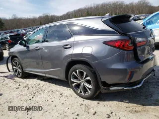 2018 Lexus RX 350L Premium with VIN JTJDZKCA8J2009751, listed as a Copart auction lot 51042215 with 104,454 mi miles and Salvage Title. Bid and sale history available at DreamBid. Image 2.