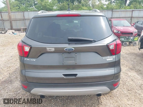 2019 Ford Escape Titanium with VIN 1FMCU0J97KUA34281, listed as a IAAI auction lot 42409579 with 55,400 mi miles and . Bid and sale history available at DreamBid. Image 17.