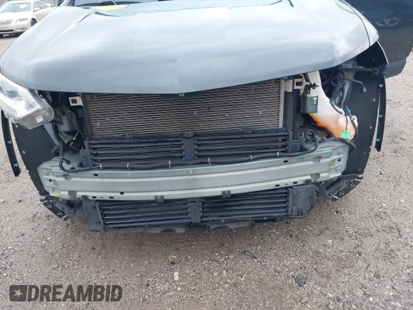 2018 Chevrolet Traverse LT Cloth z VIN 1GNEVGKW7JJ156198, wystawiony jako IAAI lot #41909259 z przebiegiem 82 719 mil mil oraz . Historia ofert i sprzedaży dostępna na DreamBid. Obrazek 6.