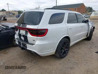 2021 Dodge Durango R/T with VIN 1C4SDJCT5MC549058, listed as a IAAI auction lot 41847281 with 99,556 mi miles and . Bid and sale history available at carsss.com. Image 4.