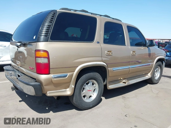 2001 GMC Yukon SLT with VIN 1GKEC13T71J113257, listed as a IAAI auction lot 41975910 with 195,509 mi miles. Bid and sale history available at carsss.com. Image 4.