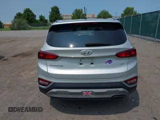 2019 Hyundai Santa Fe SE z VIN 5NMS2CAD2KH058961, wystawiony jako IAAI lot #42395683 z przebiegiem 81 228 mil mil oraz . Historia ofert i sprzedaży dostępna na DreamBid. Obrazek 16.