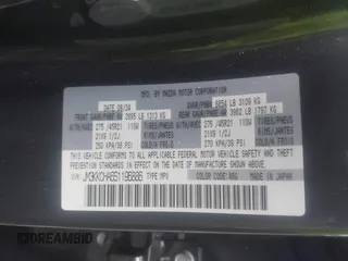 2025 Mazda CX-90 Premium Sport с VIN JM3KKCHA6S1196886, выставлен на аукционе IAAI как лот 42214967 с пробегом 23 577 миль миль и . История ставок и продаж доступна на DreamBid. Изображение 9.