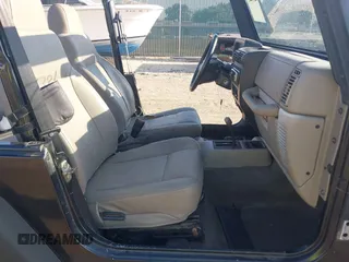 2004 Jeep Wrangler SE with VIN 1J4FA29144P797861, listed as a IAAI auction lot 42624721 with 156,867 mi miles and . Bid and sale history available at DreamBid. Image 5.