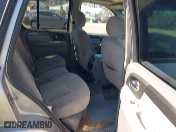 2005 GMC Envoy SLT with VIN 1GKDT13S952219826, listed as a IAAI auction lot 41783713 with 212,908 mi miles. Bid and sale history available at carsss.com. Image 8.
