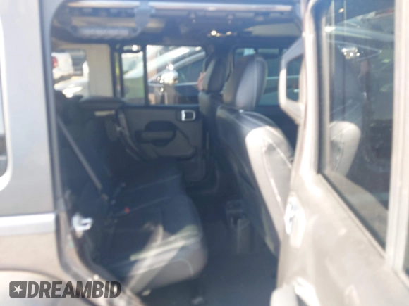 2021 Jeep Wrangler Unlimited Sport S with VIN 1C4HJXDG3MW801301, listed as a IAAI auction lot 42319387 with Not provided miles and . Bid and sale history available at DreamBid. Image 8.