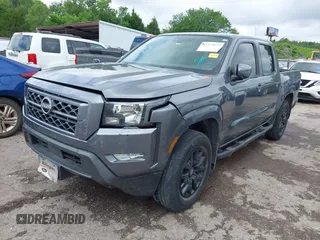 2023 Nissan Frontier SV with VIN 1N6ED1EK3PN603948, listed as a IAAI auction lot 42333677 with 38,779 mi miles and . Bid and sale history available at DreamBid. Image 2.