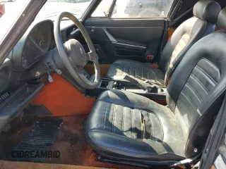 1983 Alfa Romeo Spider Veloce z VIN ZARBA541XD1016802, wystawiony jako Copart lot #51383595 z przebiegiem 127 904 mil mil oraz Czysty tytuł • Clean title. Historia ofert i sprzedaży dostępna na DreamBid. Obrazek 7.