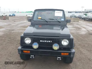 1986 Suzuki Samurai z VIN JS4JC51C4G4118117, wystawiony jako IAAI lot #41589925 z przebiegiem 70 607 mil mil oraz . Historia ofert i sprzedaży dostępna na DreamBid. Obrazek 6.